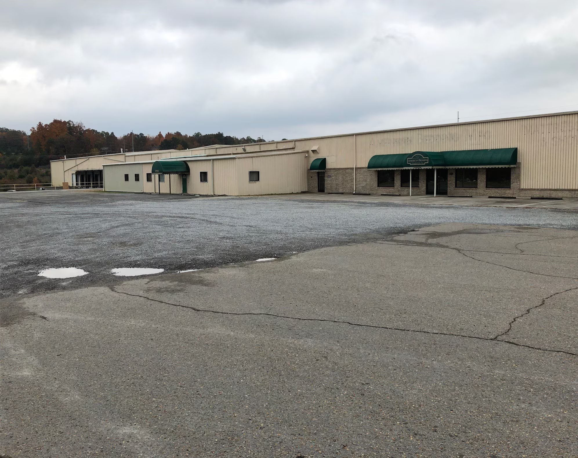Exterior view of 276 Dennis Street, Athens TN — 95,000 SF industrial facility with large parking lot